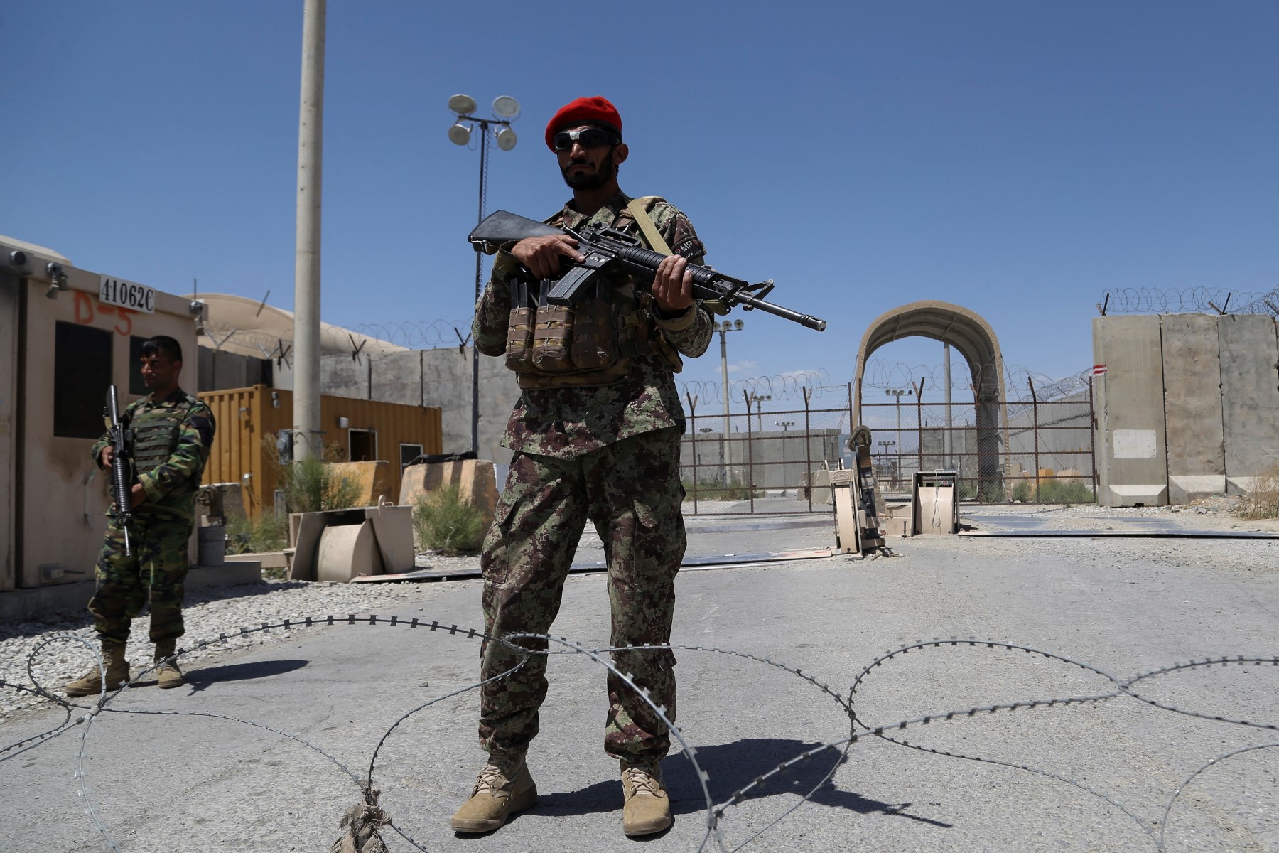 An Afghan National Army (ANA) soldier stands guard at Bagram Air Base, north of Kabul, on July 2, 2021. (AFP)