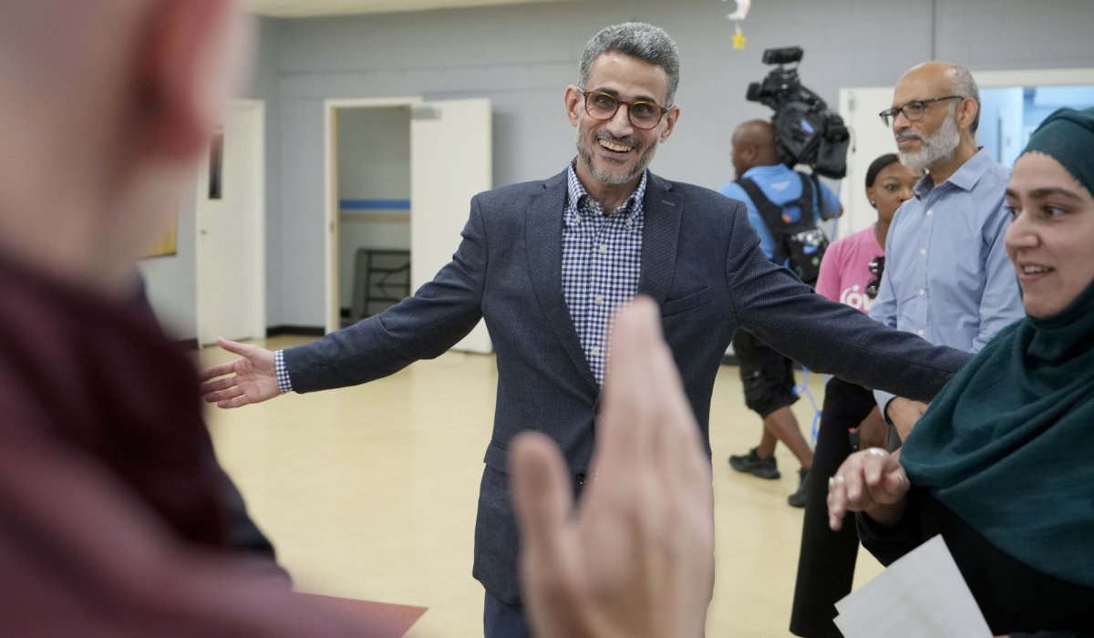 Ayman Soliman greets supporters as he arrives for a news conference after being released from ICE Custody at the Clifton Mosque on Friday, Sept. 19, 2025, in Cincinnati. (AP)
