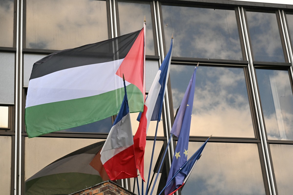 This photograph shows Palestinian, French and European flags fluttering outside the town hall of Malakoff, South of Paris. (AFP)