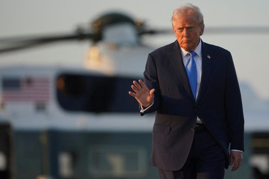 U.S. President Donald Trump walks with Marine One in the background, as he departs for New York City to attend the 80th United Nations General Assembly, at Joint Base Andrews, Maryland, U.S. (Reuters)