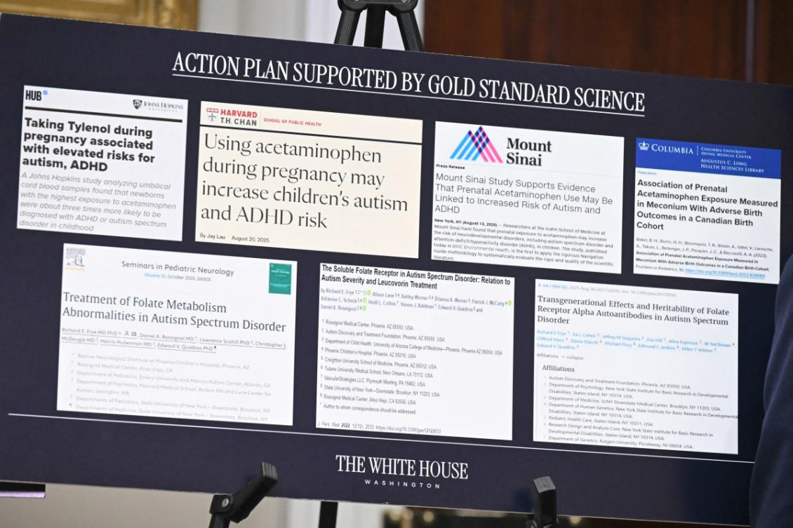A sign with clippings of medical articles is displayed during an event about autism hosted by US President Donald Trump in the Roosevelt Room of the White House in Washington, DC on September 22, 2025.(File/AFP)