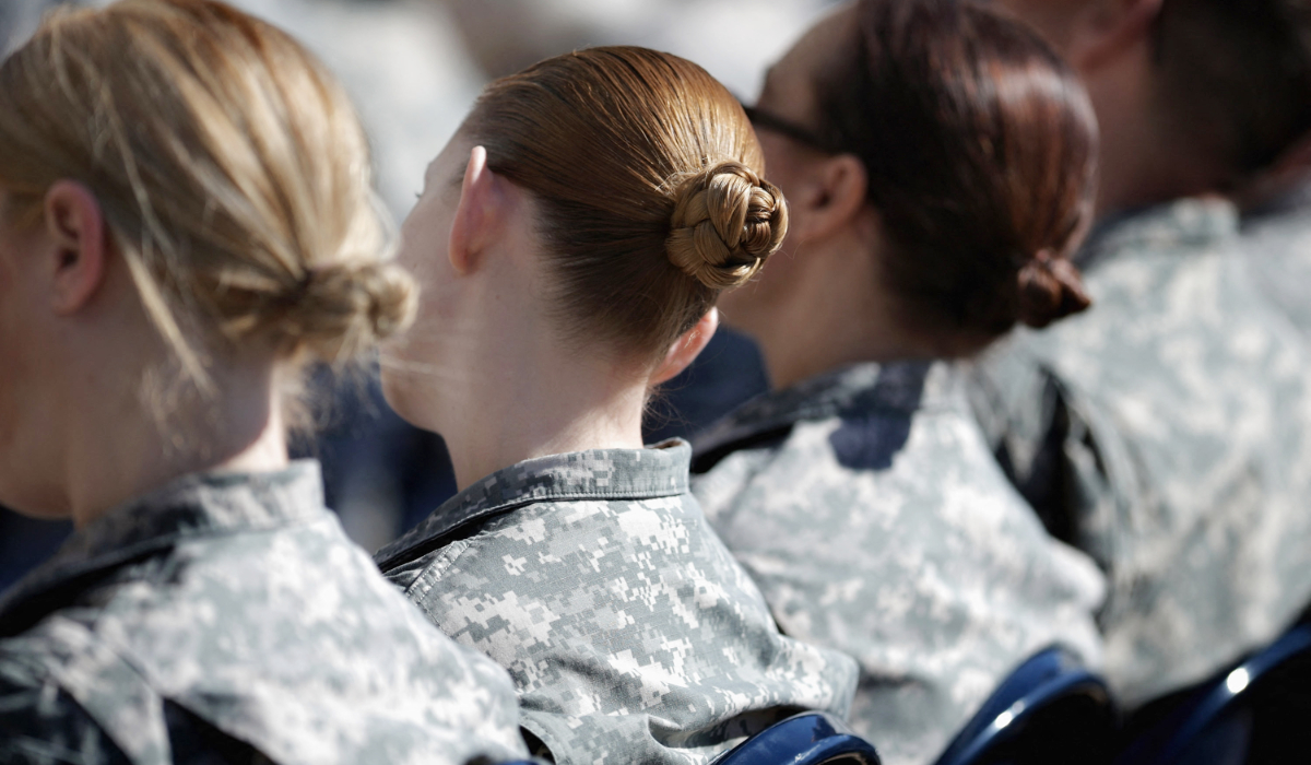 Soldiers, officers and civilian employees attend the commencement ceremony for the U.S. Army's annual observance of Sexual Assault Awareness and Prevention Month in the Pentagon Center Courtyard March 31, 2015 in Arlington, Virginia. (AFP)