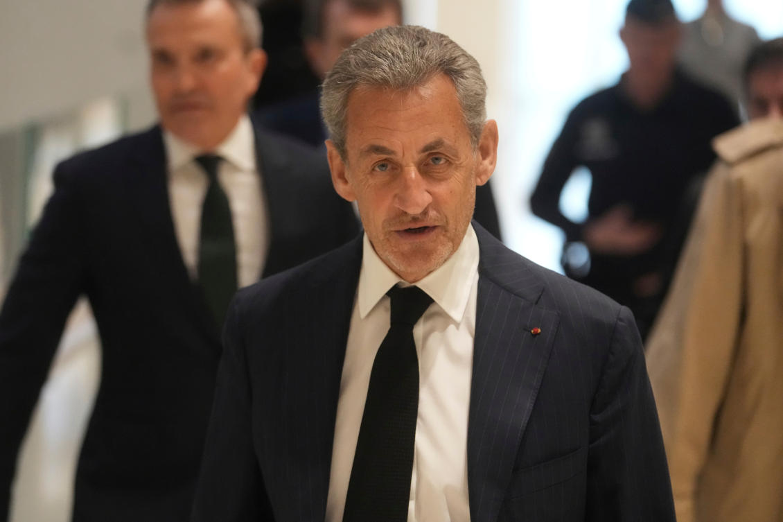 Former French President Nicolas Sarkozy arrives as he goes on trial over alleged illegal financing of his 2007 presidential campaign by the government of late Libyan leader Moammar Gadhafi, Monday, Jan. 6, 2025 in Paris. (AP)
