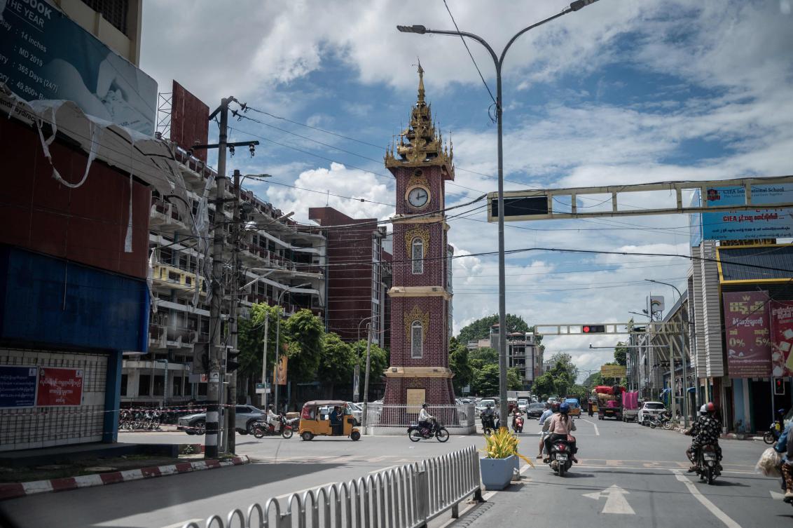 Above, the Zay Cho clock tower, which survived the March 28 earthquake, in Mandalay. More than 90,000 people, many jostling for aid, are living displaced in the Mandalay region, according to UN figures. (AFP)