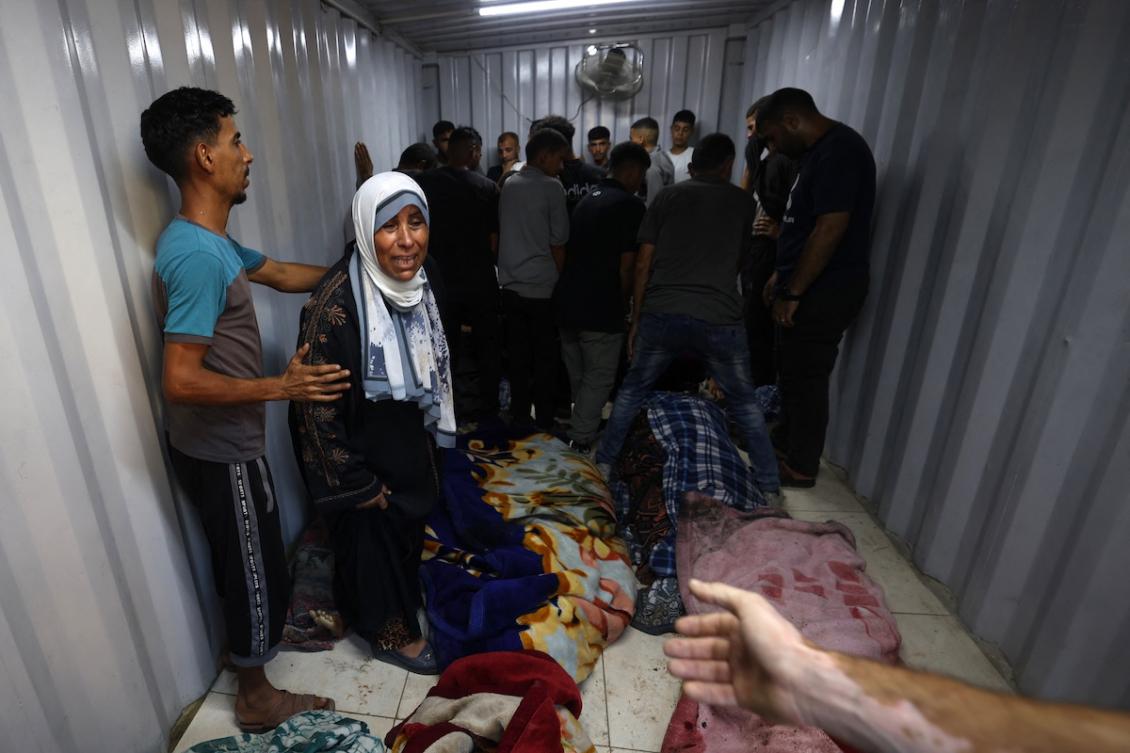 Palestinians gather around bodies, killed in an Israeli strike near the Nuseirat refugee camp, at the morgue in the al-Awda Hospital in the central Gaza Strip on September 24, 2025, as Israel presses its air and ground offensive to capture Gaza City. (FILE/AFP)