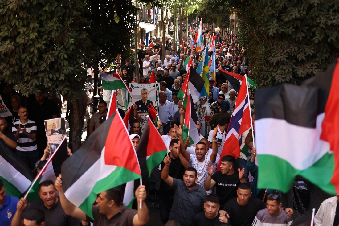 Palestinians chant slogans during a gathering in Ramallah in the Israeli occupied West Bank. (AFP)