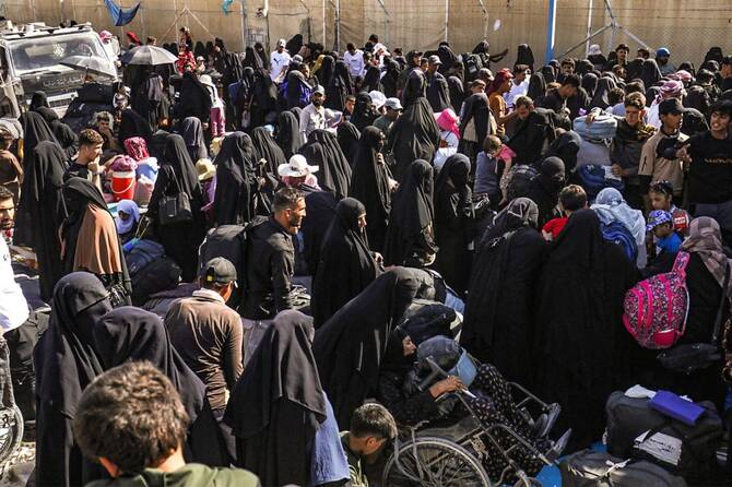 Iraqi nationals prepare to leave the Kurdish-run Al-Hol camp in northeastern Syria. (AFP/File)