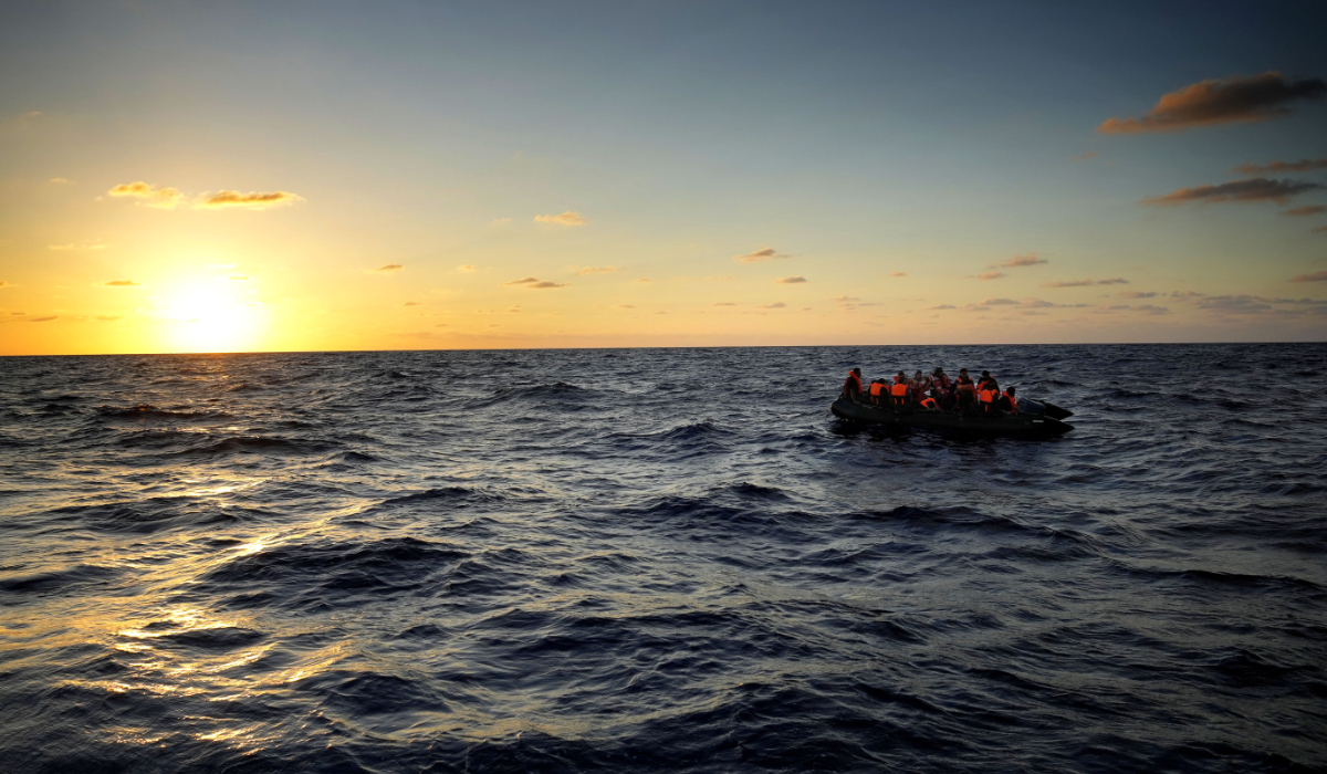 Migrants wait to be rescued by the Spanish NGO Open Arms lifeguards during a rescue operation at international waters zone of Libya SAR (Search and Rescue) in the Mediterranean sea, on Sept. 15, 2022. (AP)