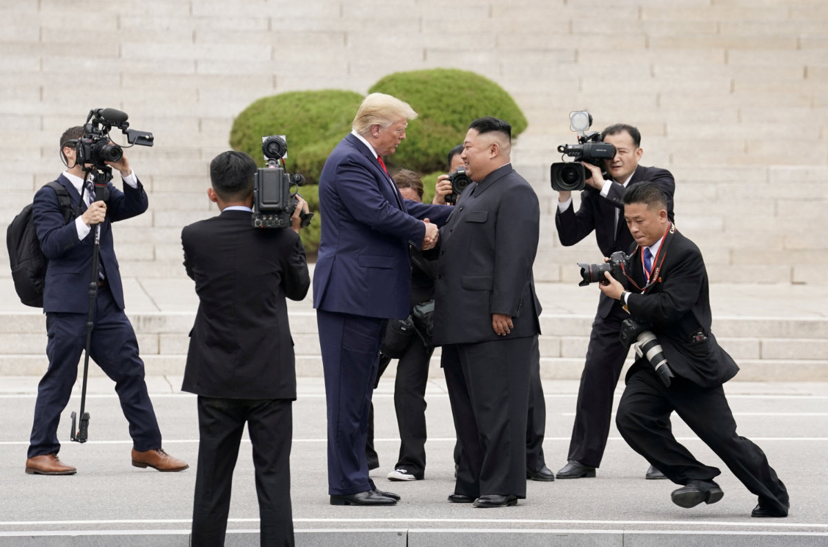 US President Donald Trump meets with North Korean leader Kim Jong Un at the demilitarized zone separating the two Koreas, in Panmunjom, South Korea, on June 30, 2019. (REUTERS)