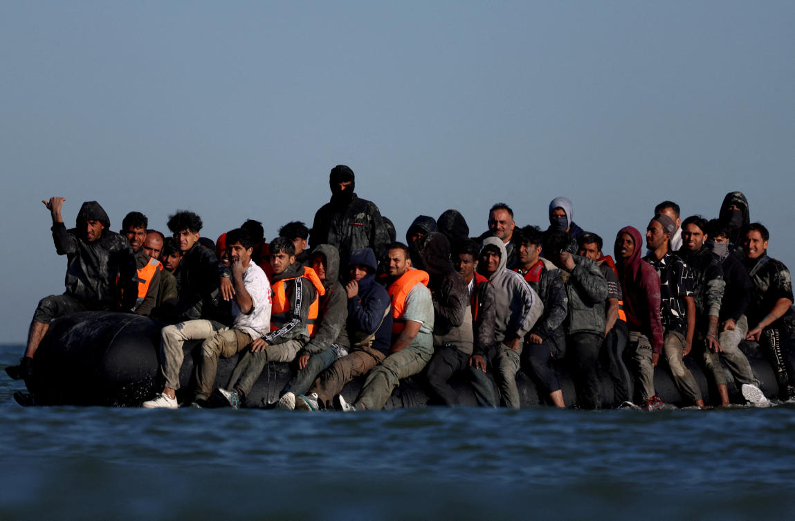 FILE PHOTO: A group of migrants on an inflatable dinghy leave the coast of northern France in an attempt to cross the English Channel to reach Britain, from the beach of Petit-Fort-Philippe in Gravelines, near Calais, France, August 25, 2025. (Reuters)