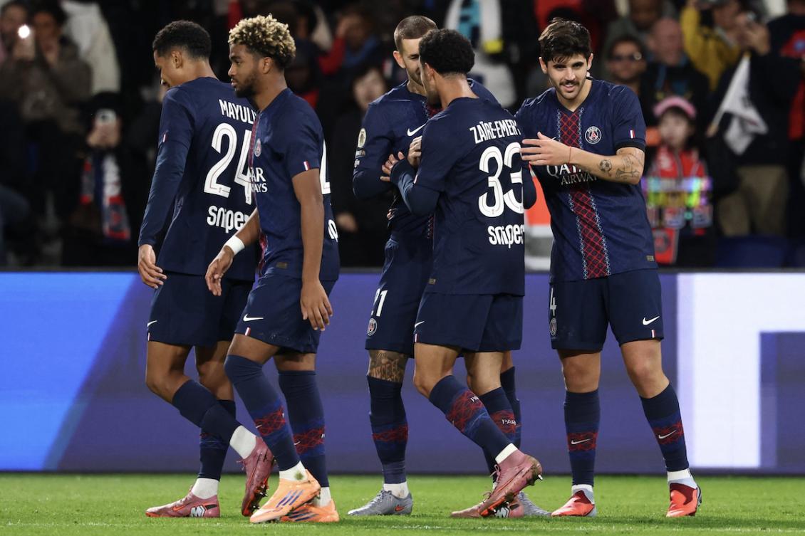 Paris Saint-Germain's Brazilian defender #04 Lucas Beraldo (R) celebrates with teammates after scoring his team's second goal during the French L1 football match between Paris Saint-Germain (PSG) and Auxerre at the Parc des Princes stadium in Paris on September 27, 2025. (FILE/AFP)