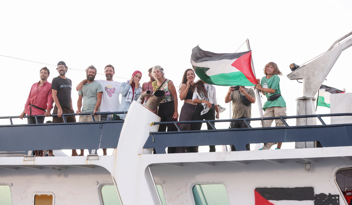 Greta Thunberg and members of the crew stand aboard a ship, part of the Global Sumud Flotilla aiming to reach Gaza and break Israel's naval blockade, as they sail off Crete island, Greece, September 25, 2025. (REUTERS)