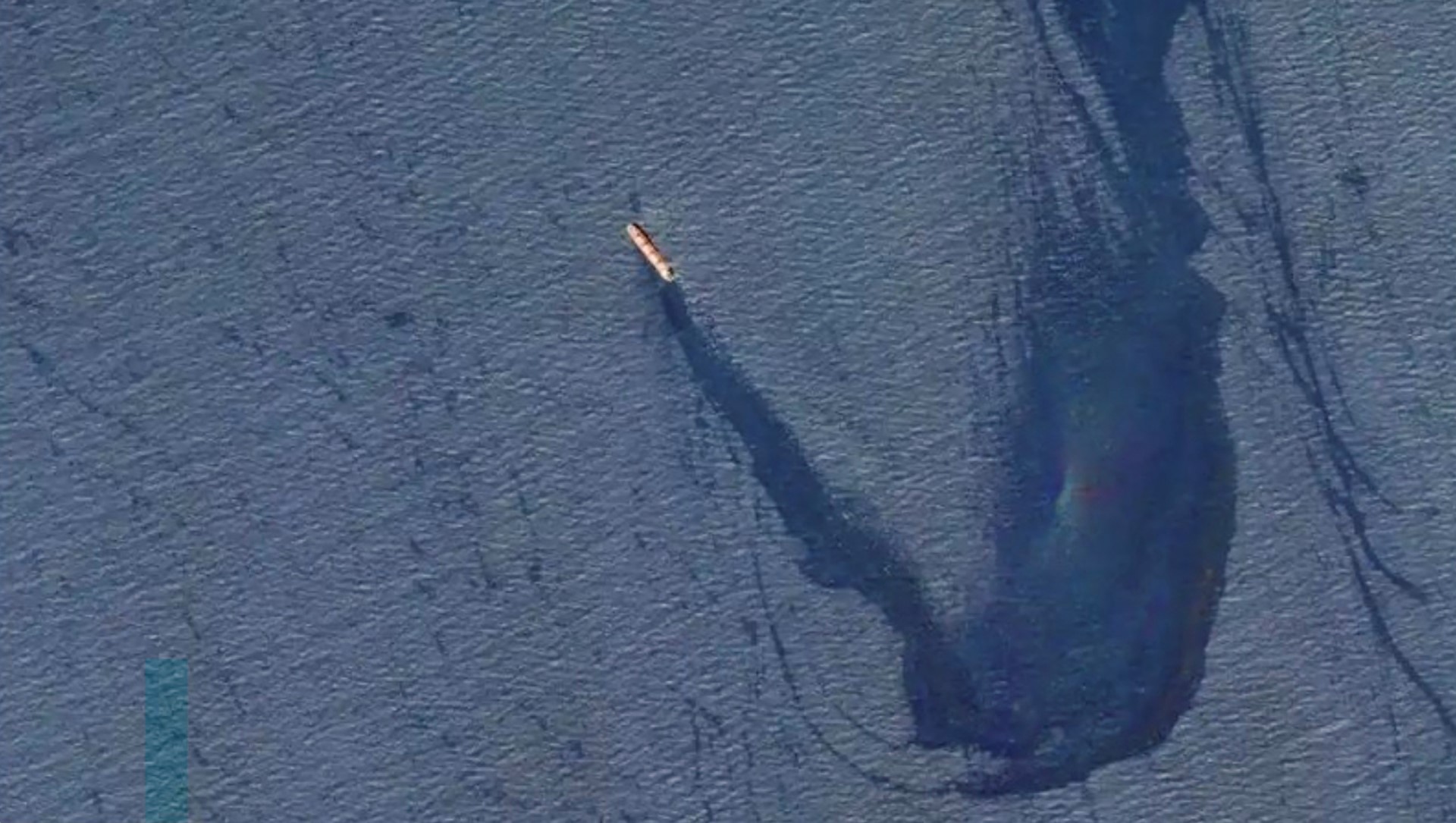 A Belize-flagged, UK-owned bulk carrier leaking oil in the Gulf of Aden after taking significant damage after an attack by the Houthis. (File/AFP)