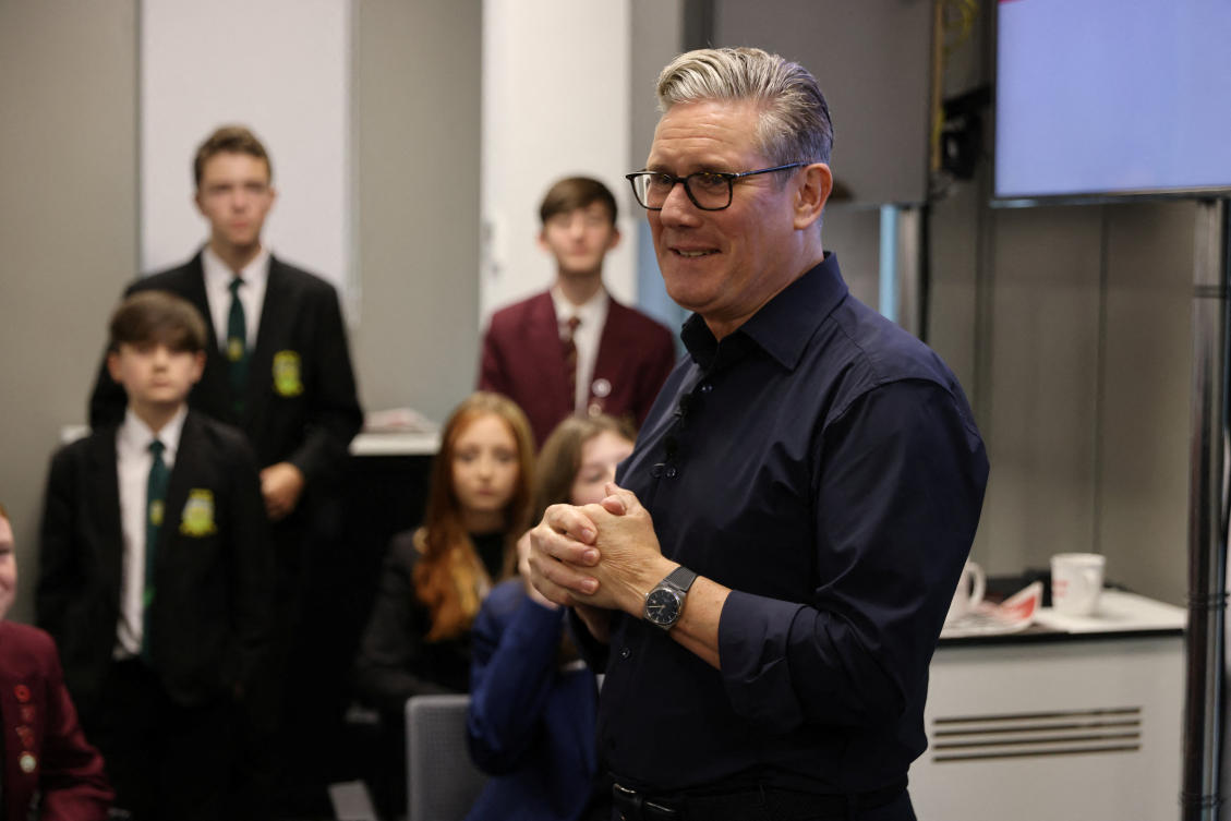 Starmer urges UK to choose decency over division as he tries to counter Nigel Farage