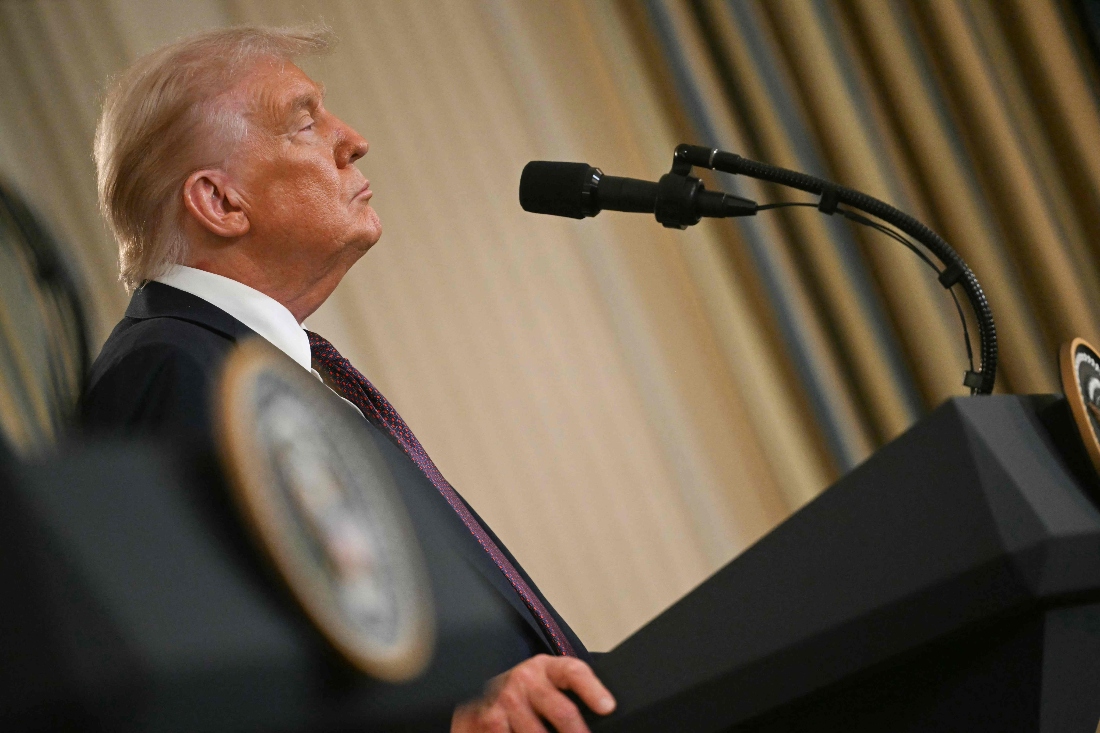 US President Donald Trump participates in a joint press conference with Israeli Prime Minister Benjamin Netanyahu in the State Dining Room of the White House in Washington, DC. (AFP)