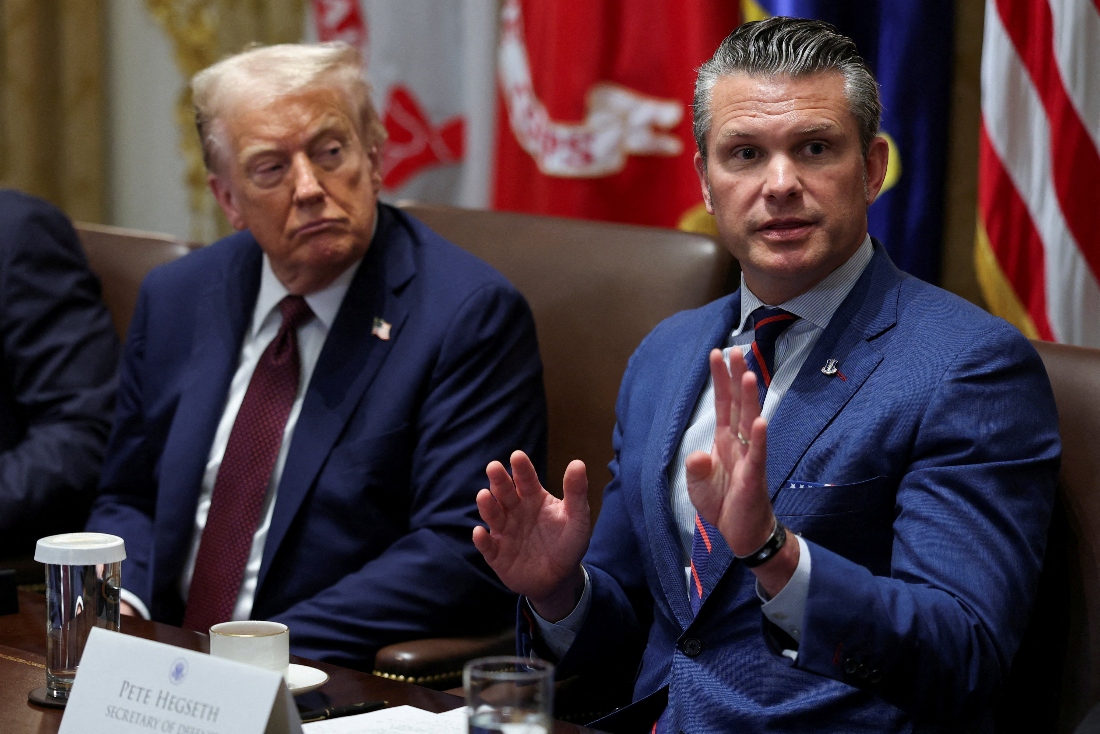 U.S. President Donald Trump and Defense Secretary Pete Hegseth attend a cabinet meeting at the White House in Washington. (Reuters)