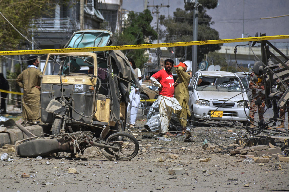 Rescue workers and security officials examine damaged vehicles at the site of a powerful car bombing, in Quetta, Pakistan, Tuesday, Sept. 30, 2025. (AP)