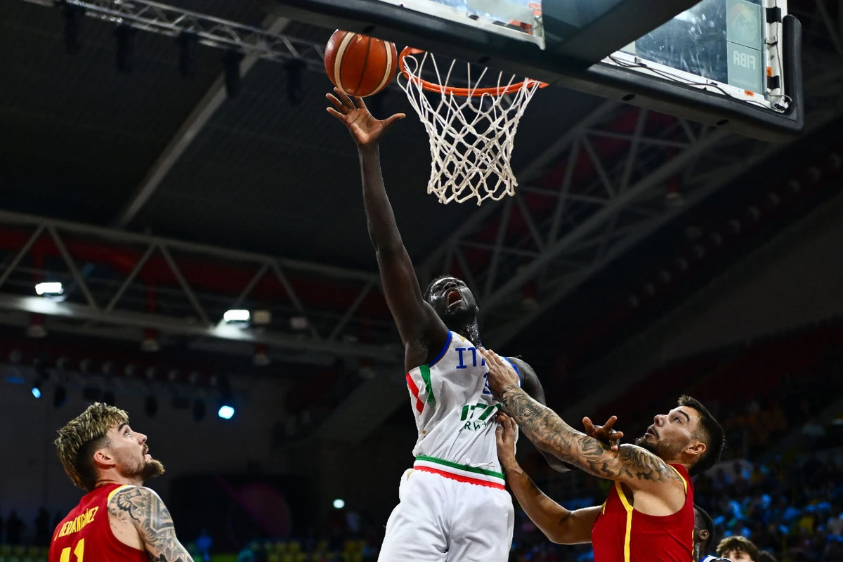 Italy’s cente Mouhamet Diouf scores during the FIBA EuroBasket 2025 basketball match between Italy and Spain at Spyros Kyprianou Arena in Limassol on Tuesday. (AFP)