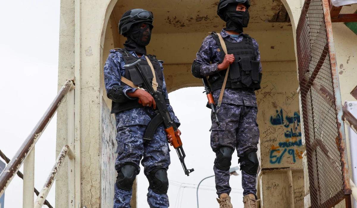 Houthi security personnel stand guard at the site of a rally by followers of the Houthi movement to commemorate the death of Imam Zaid, a central and revered figure for Zaidi Shiites, in Sanaa, Yemen July 20, 2025. (REUTERS)