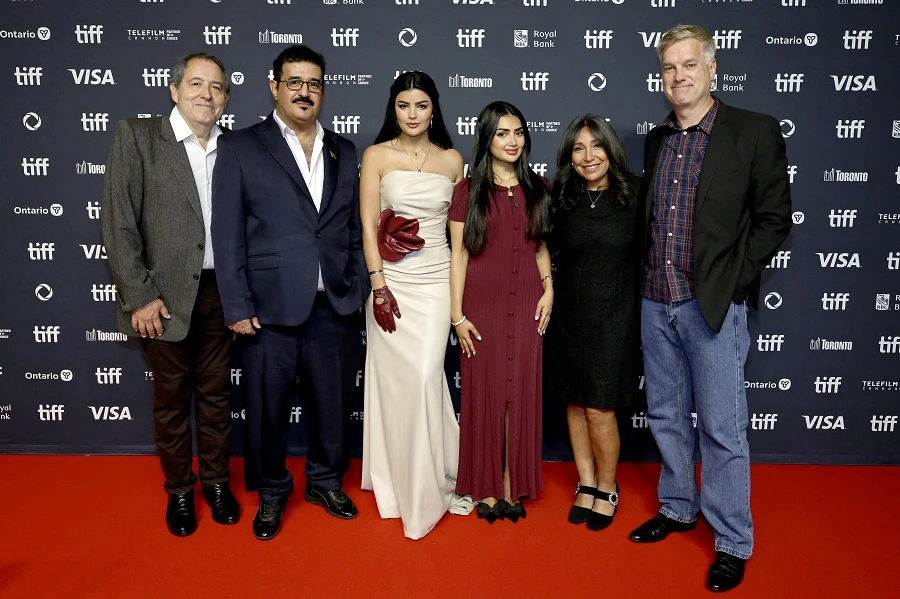 Saudi director Haifaa Al-Mansour, second from right, at the Toronto International Film Festival. (AFP)