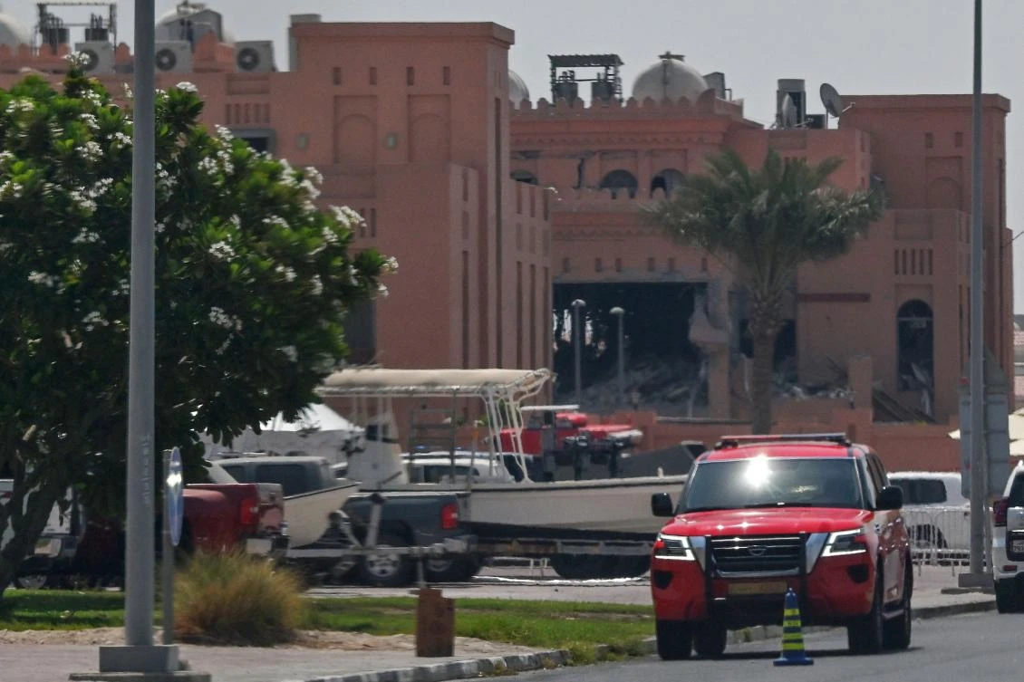 A picture taken from a distance shows in the background the damaged building housing members of Hamas's political bureau which was targeted the previous day by an Israeli strike in Qatar's capital Doha, on September 10, 2025. (AFP)