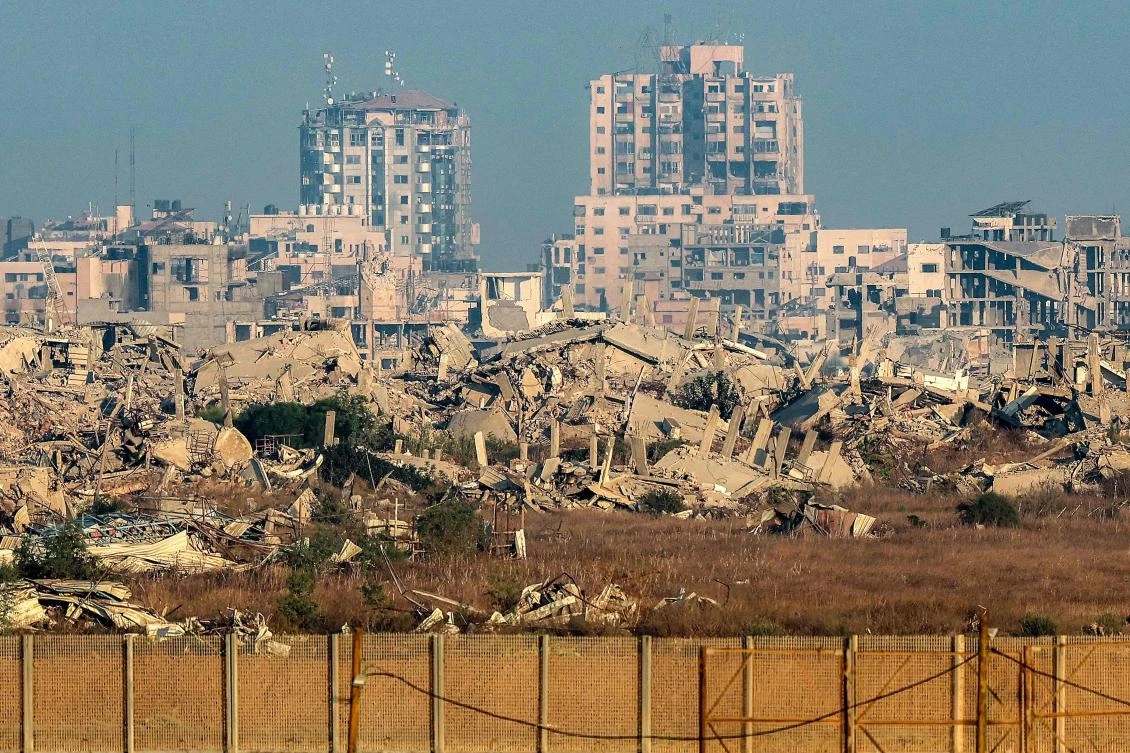 Above, destroyed buildings are pictured in the Gaza Strip from across the border fence in southern Israel on Sept. 12, 2025. (AFP)