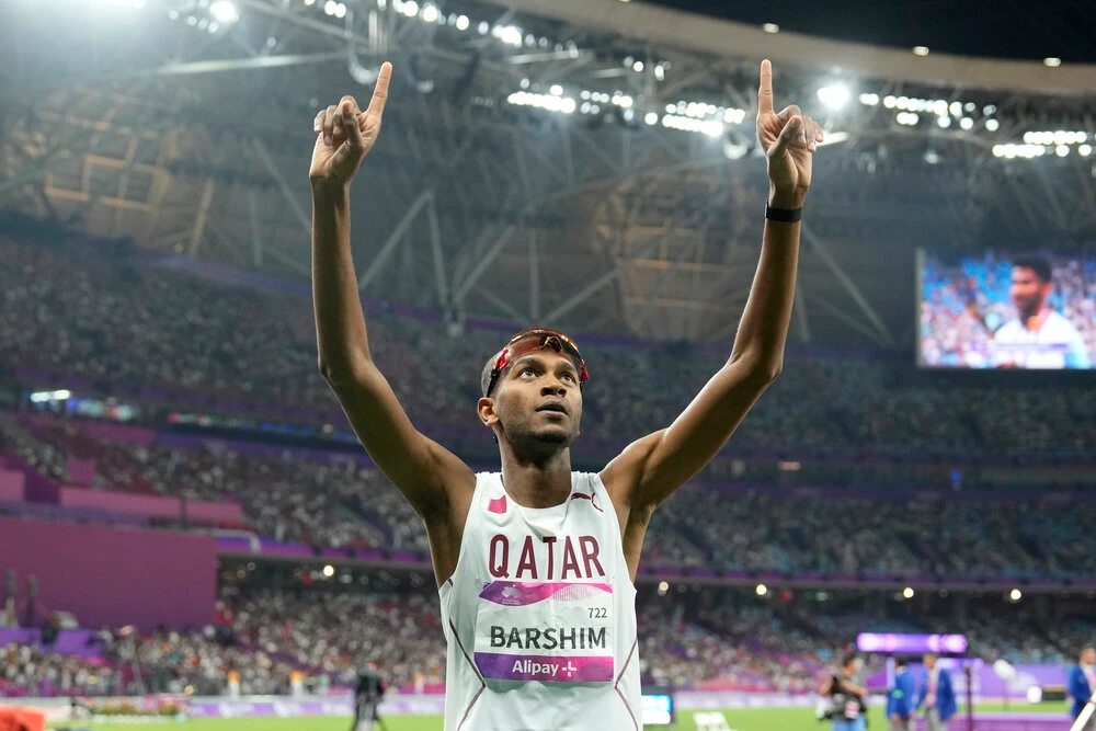 Qatar’s Mutaz Barshim celebrates after winning the men’s high jump final at the 19th Asian Games in Hangzhou, China, Oct. 4, 2023. (AP/File)