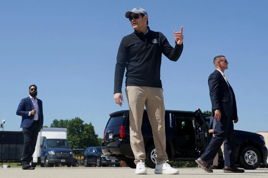 US Secretary of State Marco Rubio points as he stands on the tarmac, before departing for Israel at Joint Base Andrews, Maryland, US, September 13, 2025. (Reuters)