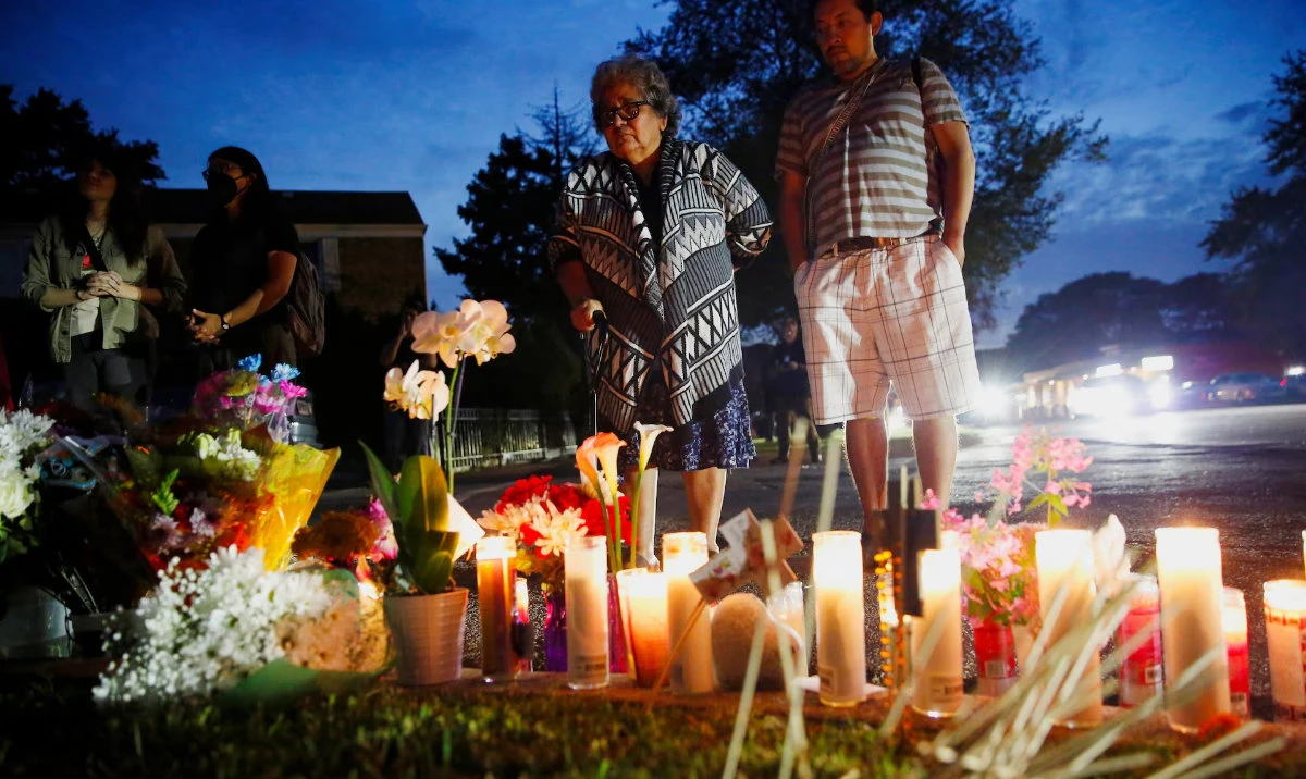 Mourners gather during a protest and candlelight vigil, a day after a US Immigration and Customs Enforcement officer fatally shot 38-year-old Silverio Villegas-Gonzalez during a traffic stop which officials said he resisted, days after US President Donald Trump ordered increased federal law enforcement presence and stepped-up immigration enforcement actions by the Department of Homeland Security, in Franklin, Illinois, US, September 13, 2025. (Reuters)