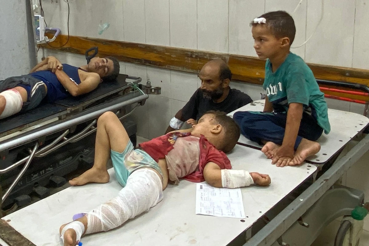 Injured children wait for treatment at Nasser Medical Complex in Khan Yunis in the southern Gaza Strip on July 28, 2025. (File/AFP)