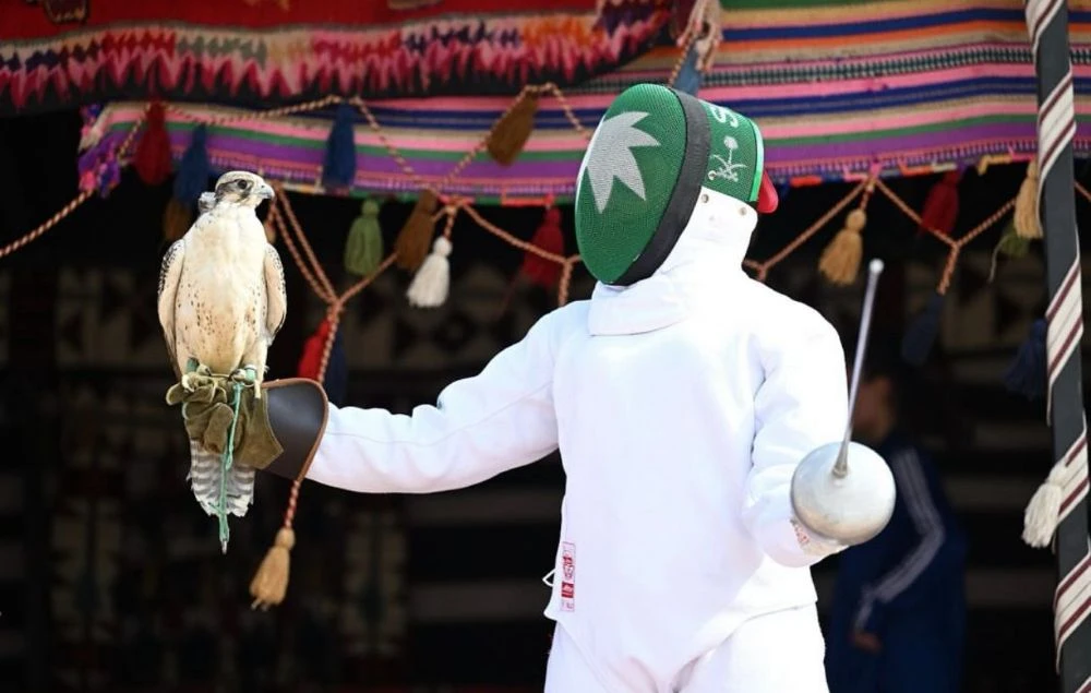A fusion of heritage and sport: Dhai Al-Amiri poses with a falcon, symbolizing Saudi culture and resilience. (Supplied)