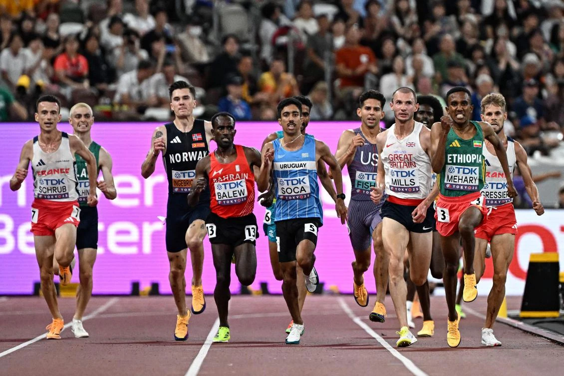 France’s Yann Schrub, Ireland’s athlete Darragh Mcelhinney, Norway’s Jakob Ingebrigtsen, Bahrain’s Birhanu Balew, Uruguay’s athlete Valentin Soca, US’ Grant Fisher, Great Britain’s George Mills, Ethiopia’s Biniam Mehary and France’s Jimmy Gressier compete in the men’s 5000m heats during the World Athletics Championships in Tokyo on Sept. 19, 2025. (AFP)
