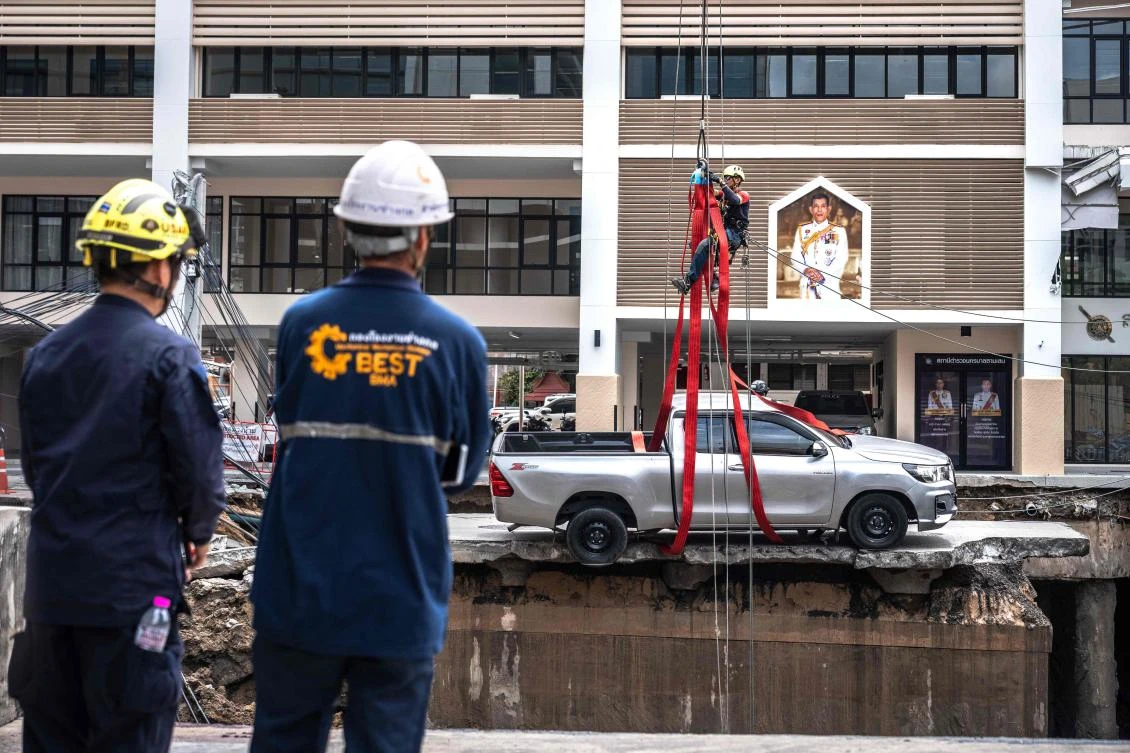 Huge Bangkok sinkhole opens as road collapses