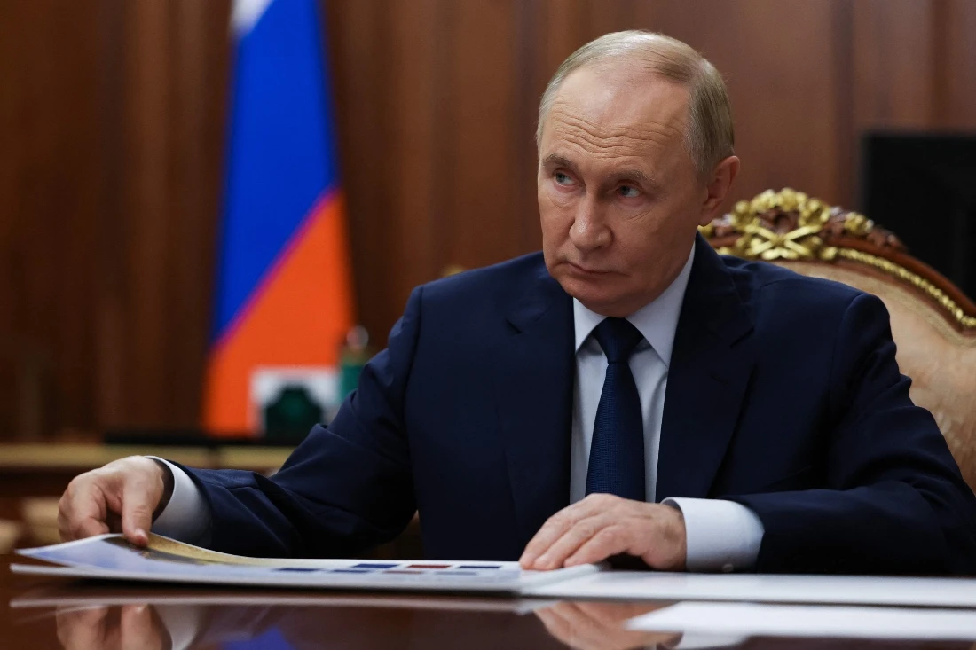 Russia's President Vladimir Putin attends a meeting at the Kremlin in Russia. (AFP)