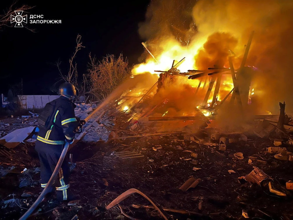 A firefighter works at the site of buildings hit during the Russian air strike, amid Russia’s attack on Ukraine, in Zaporizhzhia, Ukraine in this handout picture released Sept. 23, 2025. (Reuters)