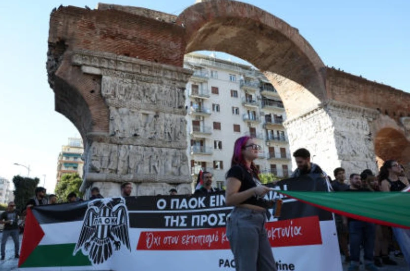 PAOK fans display a sign with a Palestine flag on it during a protest ahead of their team’s UEFA Europa League match against Maccabi Tel Aviv at the city center in Thessaloniki, Greece, Sept. 24, 2025. (Reuters)