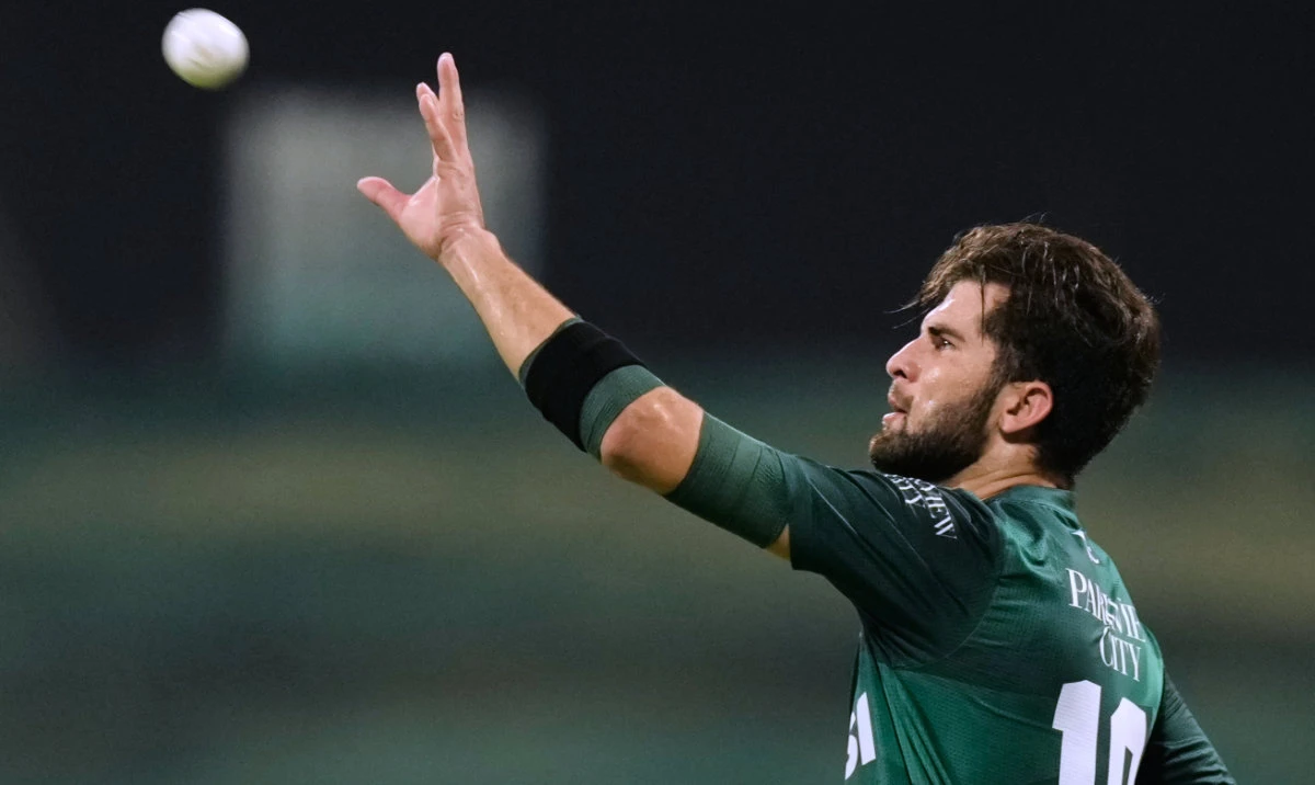 Pakistan's Shaheen Shah Afridi takes a ball during the Asia Cup Cricket match between Pakistan and Sri Lanka at Zayed Cricket Stadium in Abu Dhabi, United Arab Emirates, Tuesday, Sept. 23, 2025. (AP)
