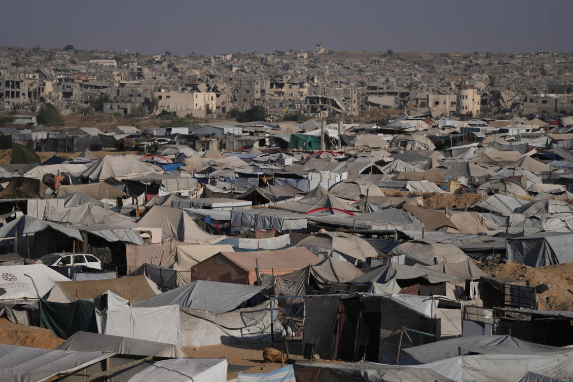 A tent camp for displaced Palestinians stretches along the Muwasi, an area that Israel has designated as a safe zone, in Khan Younis, in the southern Gaza Strip, Sept. 23, 2025. (AP)