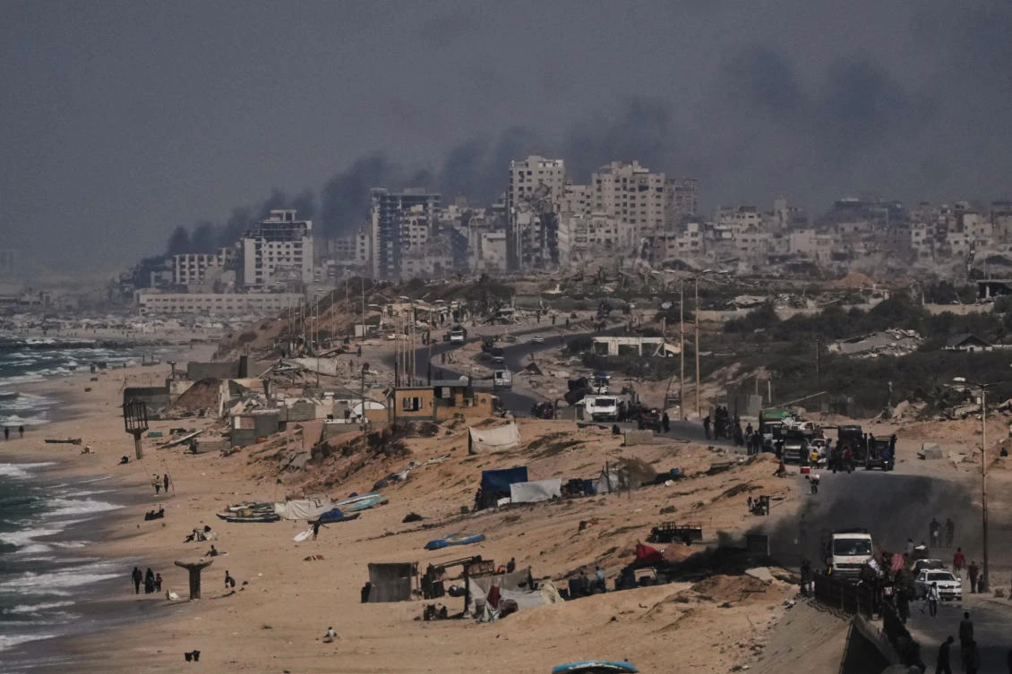 Smoke rises following an Israeli military strike in Gaza City, as seen from the central Gaza Strip, Sept. 26, 2025. (AP)