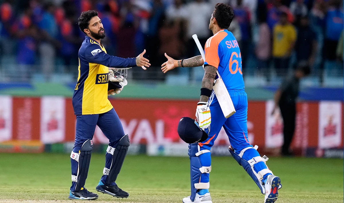India’s captain Suryakumar Yadav shakes hands with Sri Lanka’s Kusal Mendis (left) after winning the Asia Cup cricket match against Sri Lanka at Dubai International Cricket Stadium, in Dubai, United Arab Emirates, on September 26, 2025. (AP)