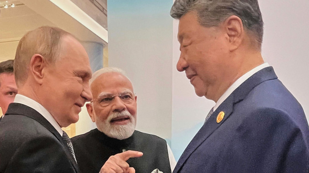 Vladimir Putin, Narendra Modi and Xi Jinping at the SCO summit in Tianjin, China. (AP)