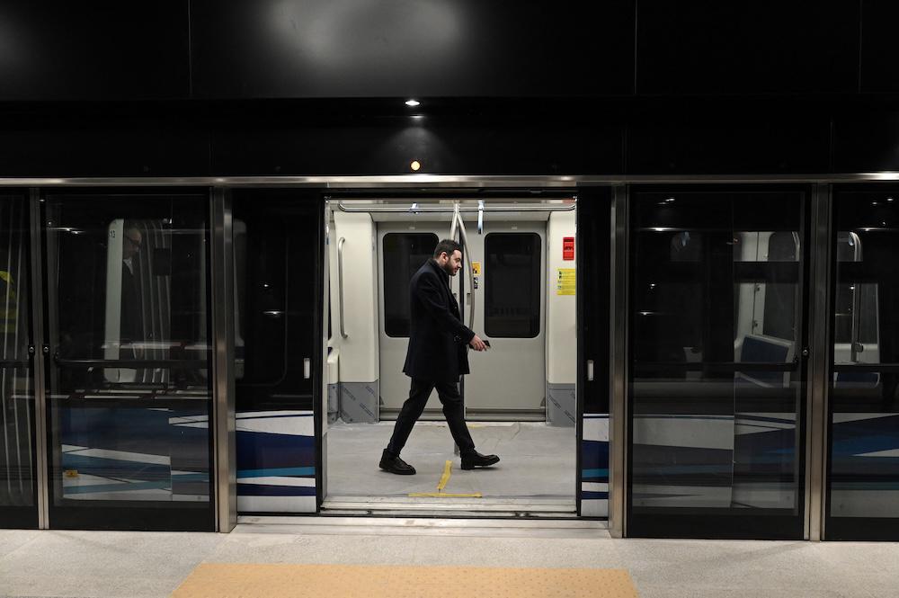 Greek trains, ferries and taxis were halted during a one-day general strike against extended working hours. Above, a passenger at the Thessaloniki Metro. (AFP file photo)