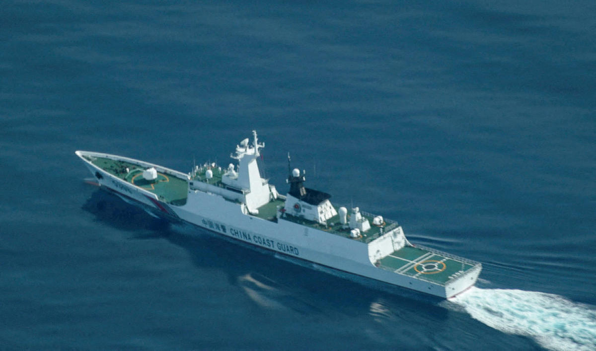 China seized control of Scarborough Shoal in 2012 after a standoff with the Philippines and has since kept a deployment of coast guard and fishing trawlers there. Above, a China Coast Guard ship navigating near the disputed Scarborough Shoal on Aug. 13, 2025. (Reuters)