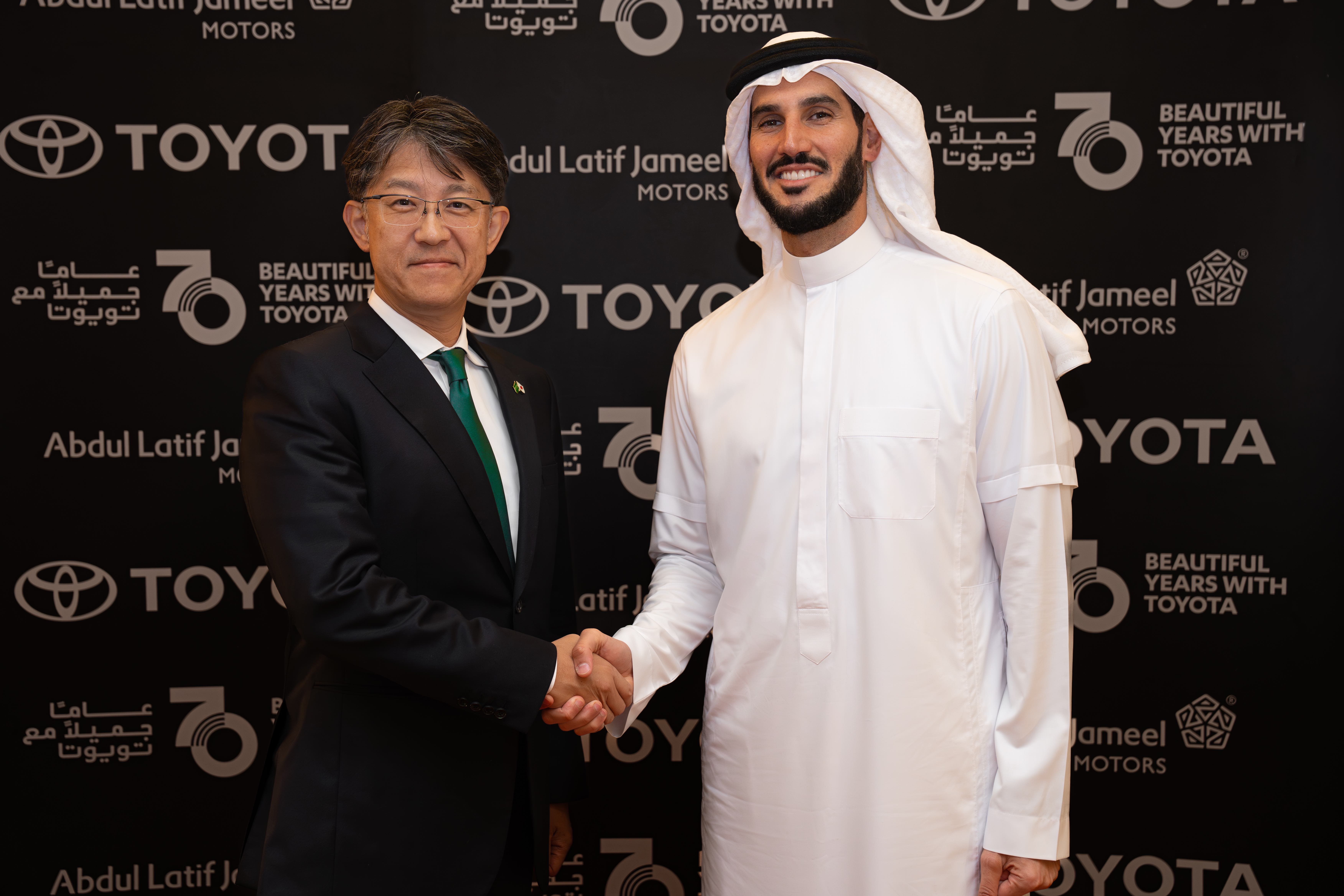 Koji Sato, president and CEO of Toyota Motor Corporation, and Hassan Jameel, vice chairman, Abdul Latif Jameel, Saudi Arabia, at the celebratory event.