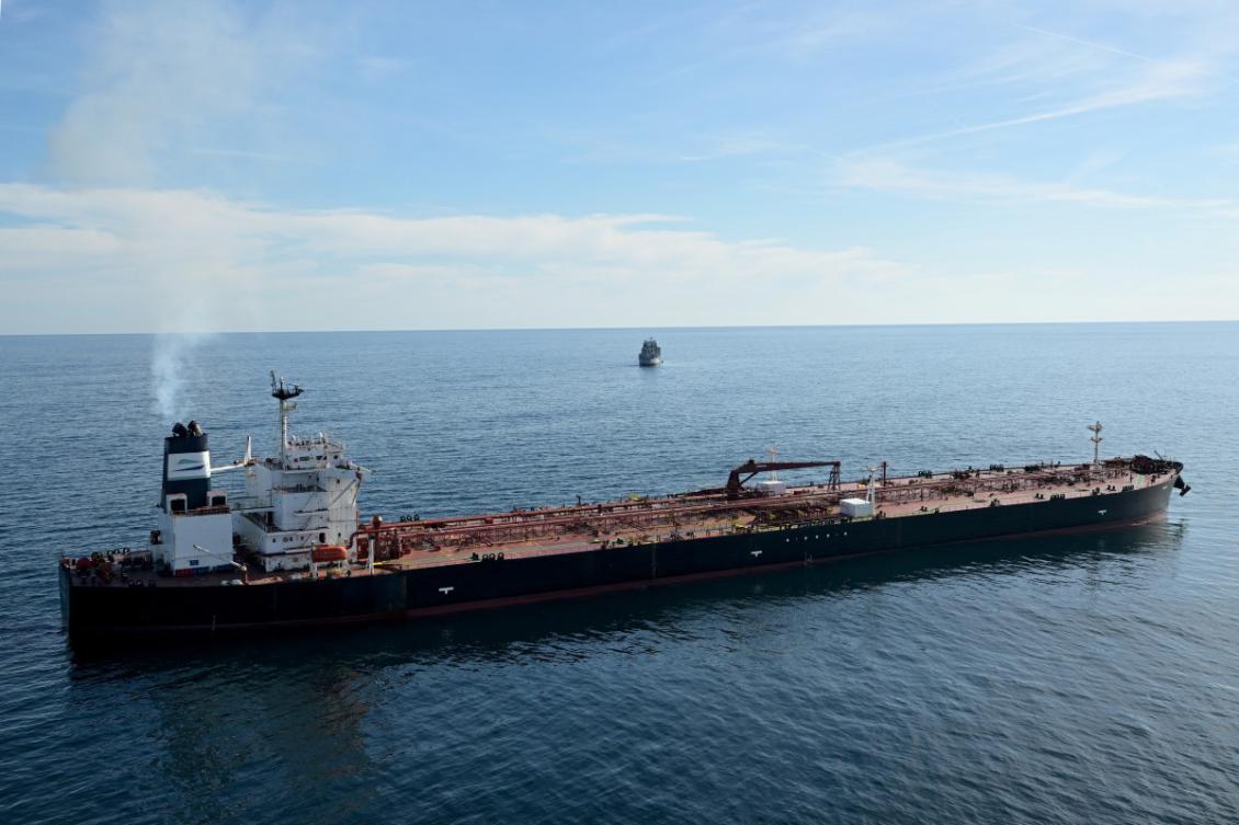 This aerial picture taken on October 1, 2025 off the coast of the western France port of Saint-Nazaire shows the tanker Boracay from Russia's so-called "shadow fleet" suspected of being involved in drone flights over Denmark which sailed off the Danish coast between September 22 and 25, with a boat of the French Navy in the background.(File/AFP)