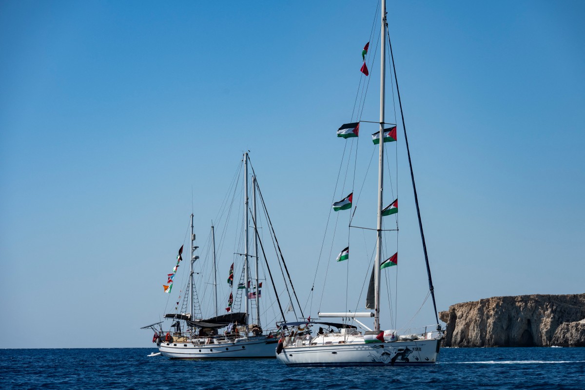 Members of the group of ships of the Global Sumud Flotilla to Gaza are seen moored at the small island of Koufonisi, south of the island of Crete, on September 26, 2025. (File/AFP)