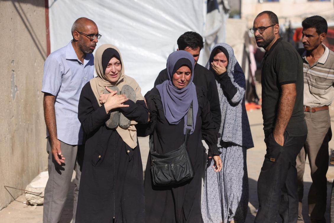 Palestinians mourn outside Deir Al-Balah’s Al-Aqsa Martyrs Hospital where casualties of Israeli strikes in the central city of the besieged Gaza Strip were transported on October 2, 2025. (AFP)