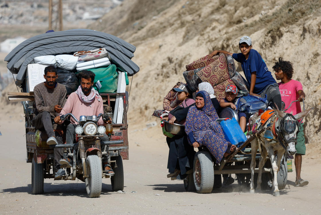 Displaced Palestinians flee the Israeli military operation in northern Gaza on Friday. (Reuters)