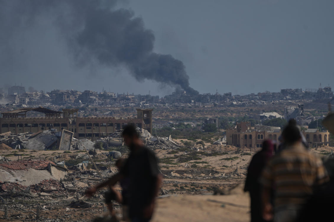 Smoke rises from an Israeli military strike in Gaza City, as seen from the central Gaza Strip on Thursday. (AP)