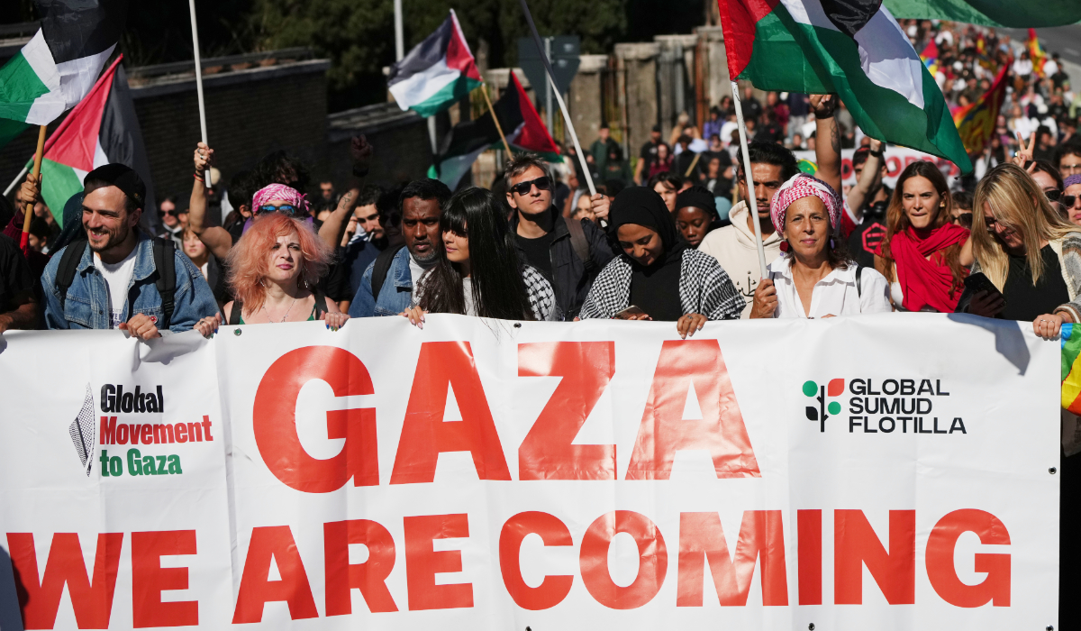 Pro-Palestinian demonstrators march along the Rome's ring road as they gather for a national general strike called by different unions to protest against the situation in Gaza two days after Israeli forces intercepted a Gaza-bound aid flotilla in the Mediterranean Sea, in Rome, Friday, Oct. 3, 2025. (AP)
